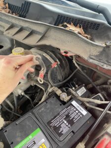Where is the Battery in a 2012 Jeep Grand Cherokee